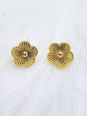 Elegant and timeless gold-tone flower stud earrings